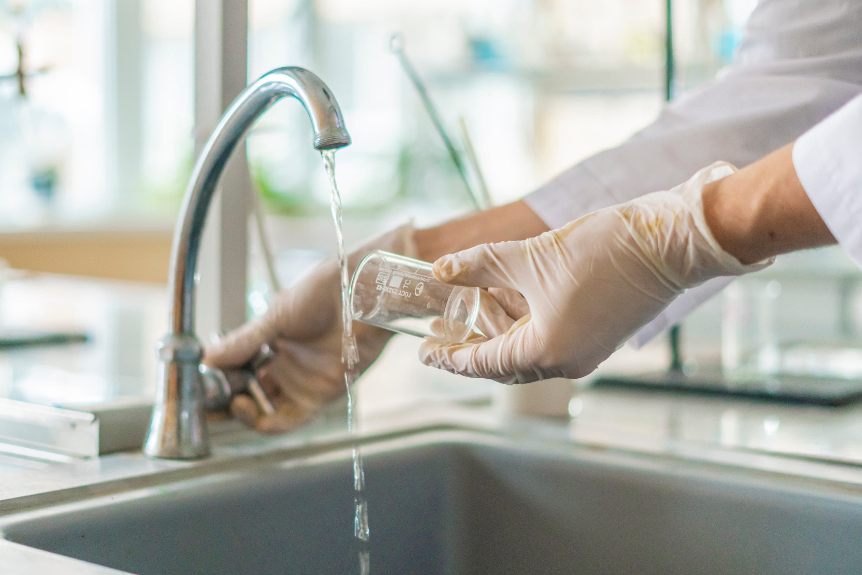 Testing water for coal ash deposits.