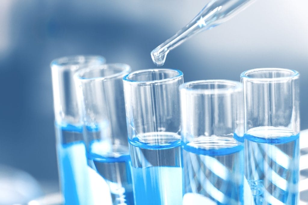 Boron Water Testing with Test Tubes and Droplet