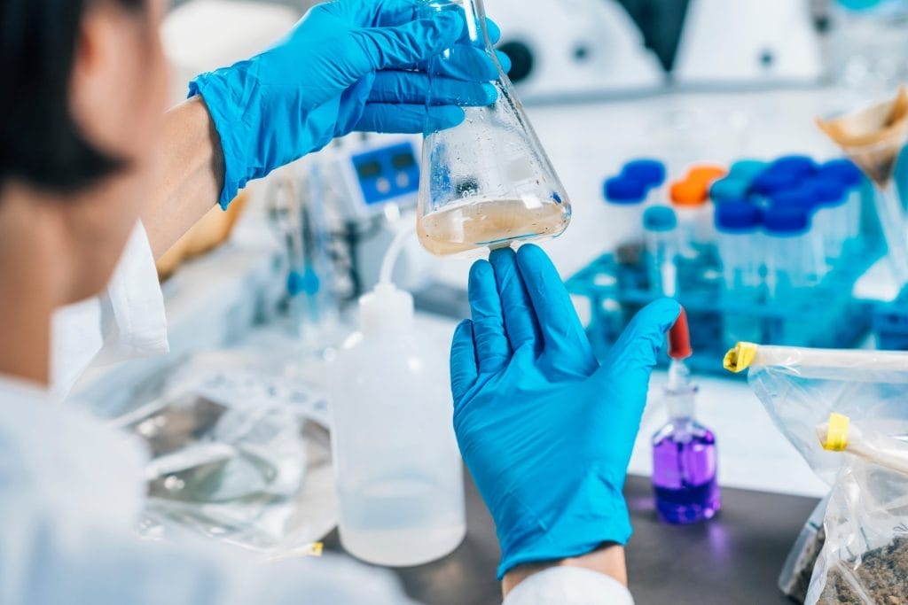Scientist Conducting Commercial Standard Water Testing in Laboratory
